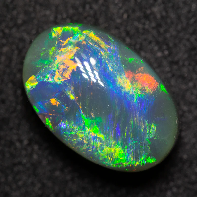 2.62 ct black opal 10.7x7.1x5.1mm - Image 3