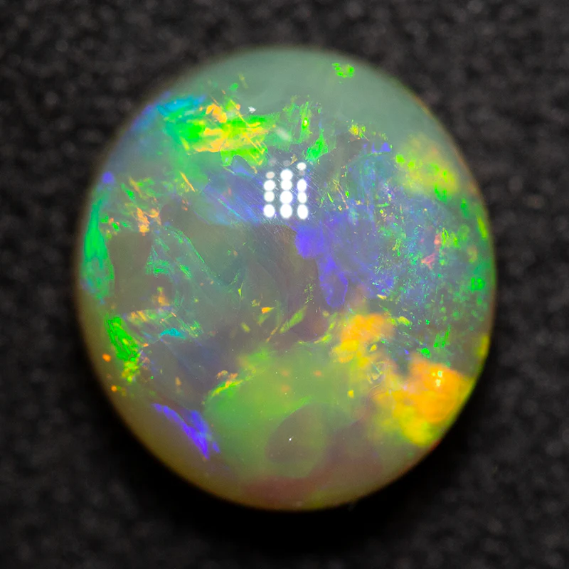 2.62 ct crystal opal 9.2x8.4x5.6mm - Image 3