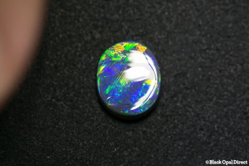2.64 ct black opal 11.5x9.5x4mm - Image 2