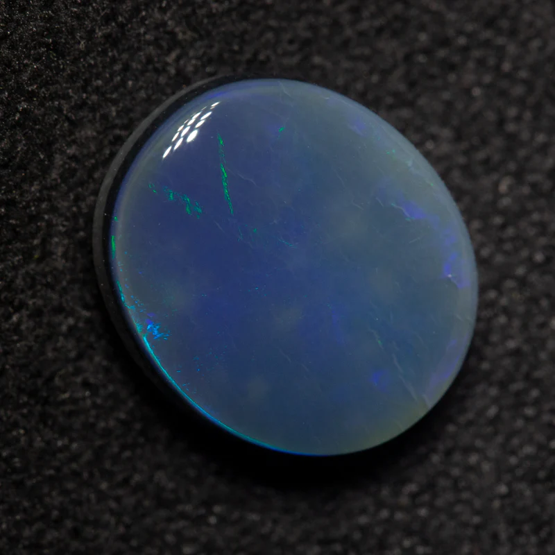 2.65 ct black opal 10.4x8.9x4.4mm - Image 2