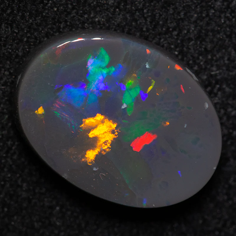 2.65 ct black opal 12.3x9.3x3mm - Image 2