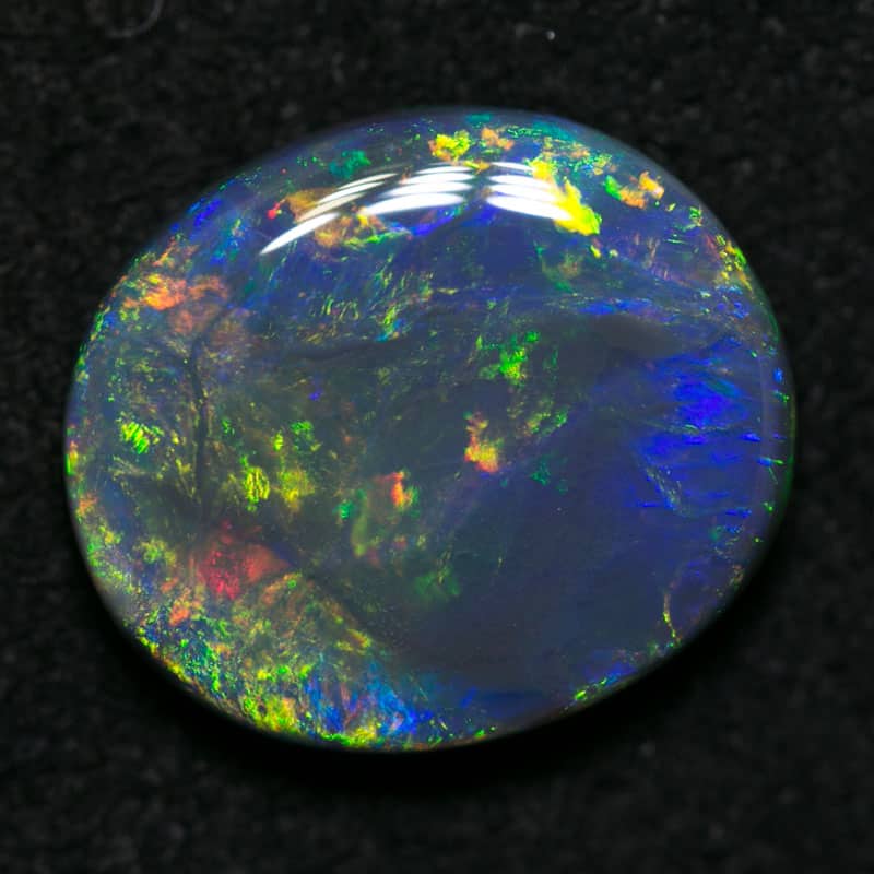 2.69 ct black opal 11x10x3mm - Image 2