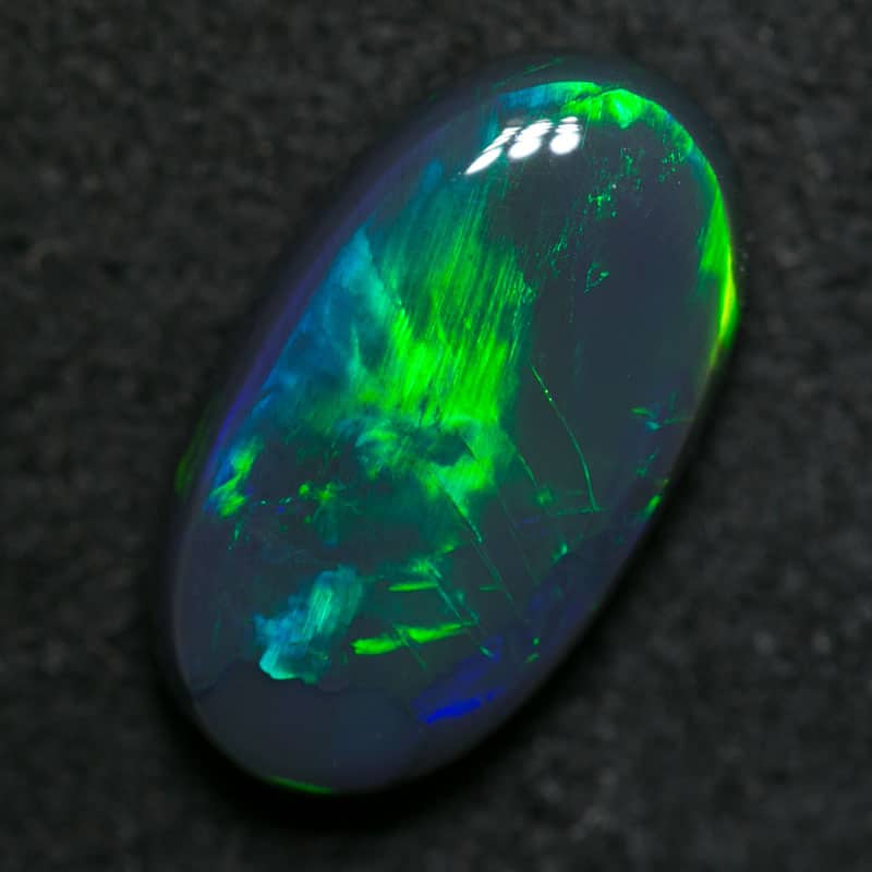 2.70 ct black opal 12x8x4mm - Image 2