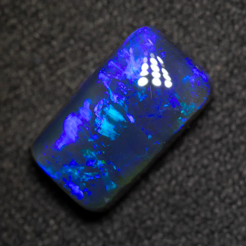 2.73 ct black opal 11.1x6.4x4.3mm - Image 2