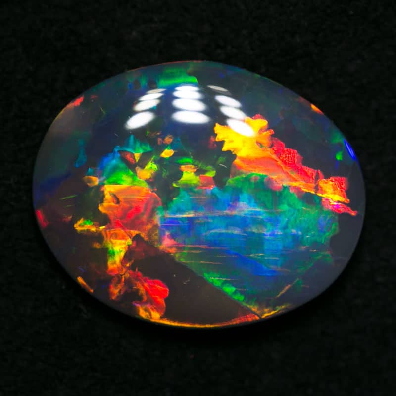 2.74 ct black opal 13x11x3mm - Image 2