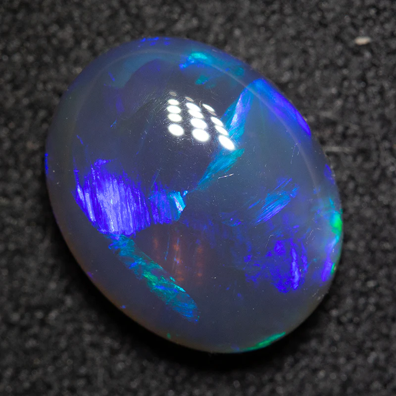2.76 ct black opal 11x9x4.5mm - Image 2