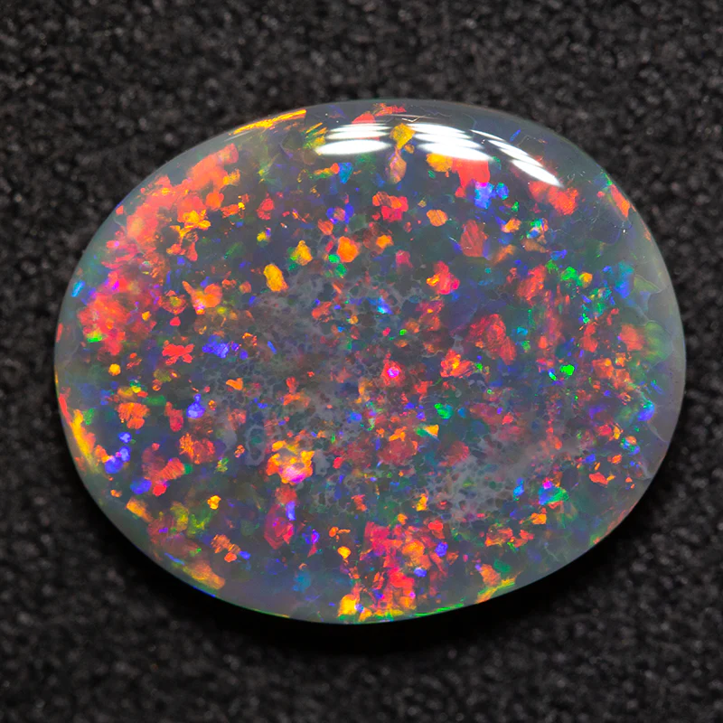 2.76 ct black opal 12.7x10.6x3mm - Image 2
