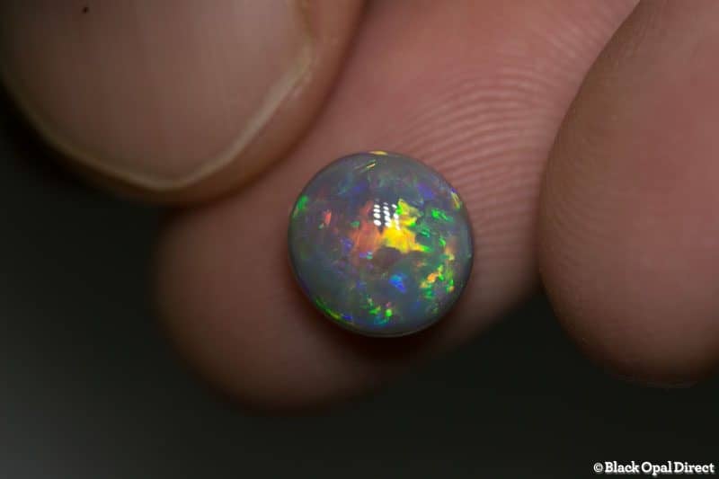 2.80 ct dark opal 9mm round x5mm thick - Image 2
