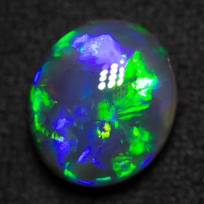 2.82 ct black opal 10.1x8.7x5.3mm - Image 2