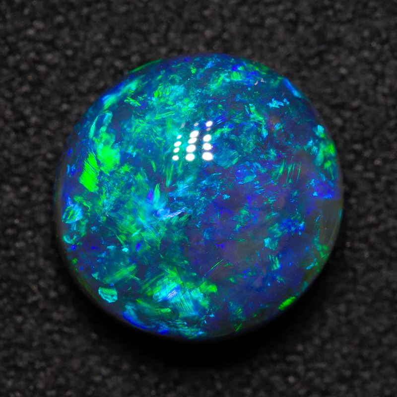 2.82 ct black opal 9.5x9.1x5.2mm - Image 2