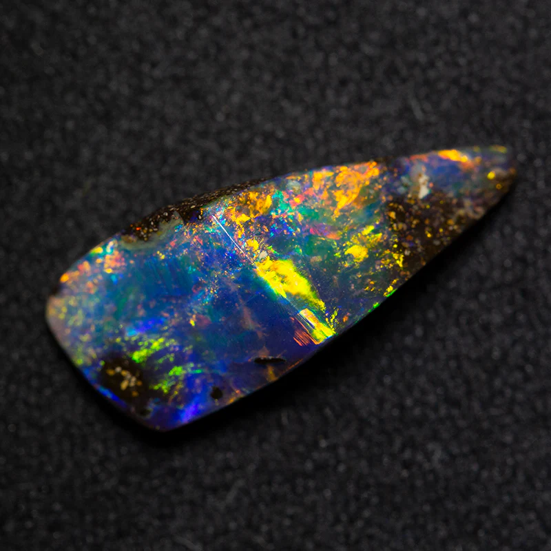 2.83 ct boulder opal 14.4x6.2x5.1mm - Image 2