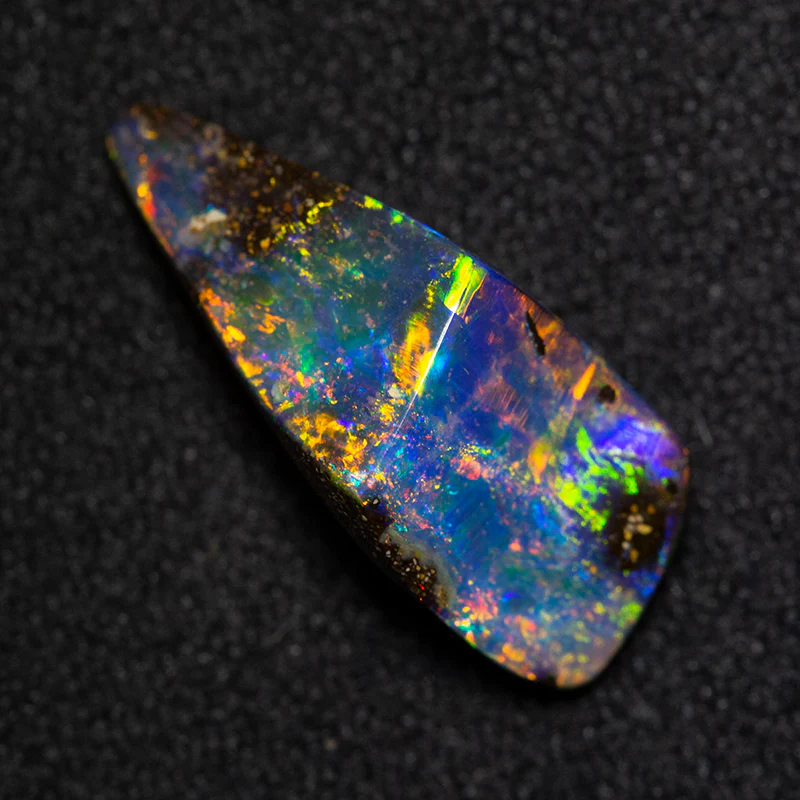 2.83 ct boulder opal 14.4x6.2x5.1mm - Image 3
