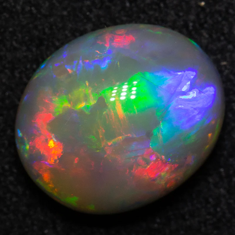2.83 ct dark crystal opal 10.3x8.6x5.4mm - Image 2