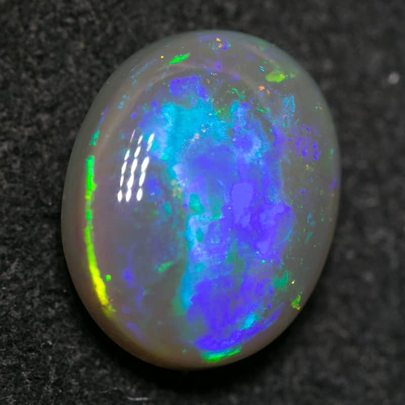 2.84 ct dark opal 11x9x4.5mm - Image 2