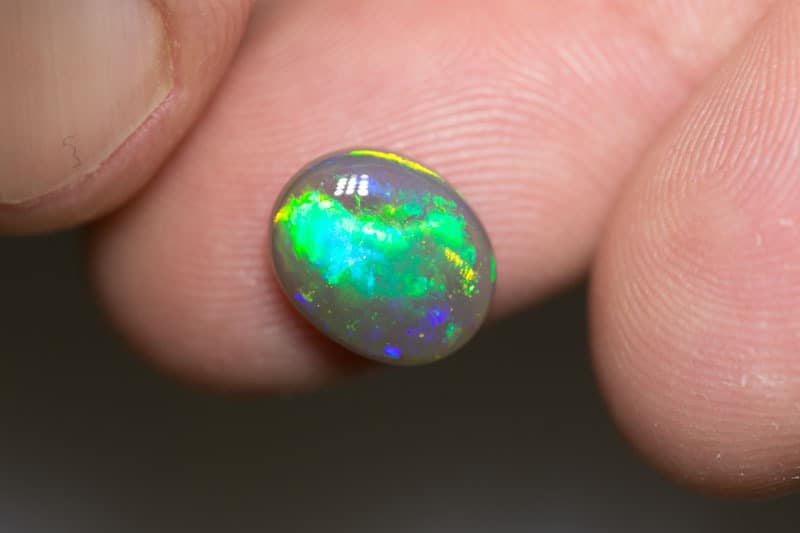 2.84 ct dark opal 11x9x4.5mm - Image 4