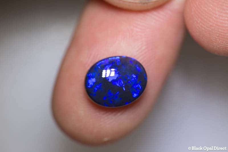 2.88 ct black opal 11x9x4mm - Image 2