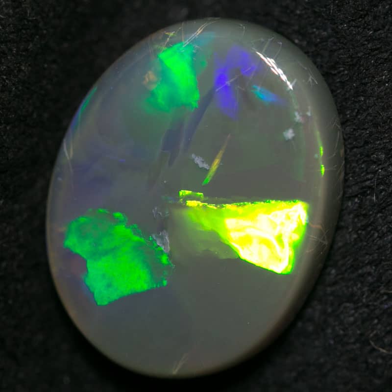 2.88 ct black opal 12x9.5x4mm - Image 2