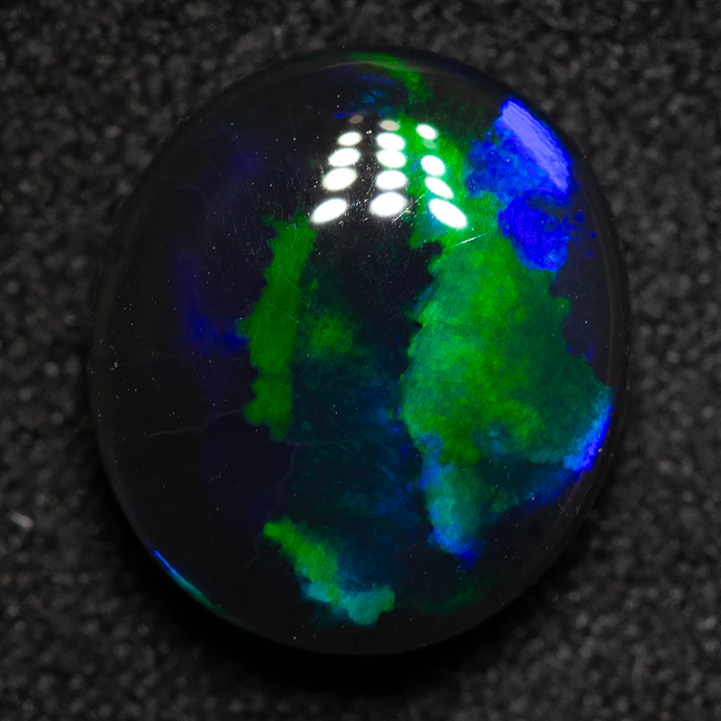 2.94 ct black opal 10.7x9.5x4.6mm - Image 3