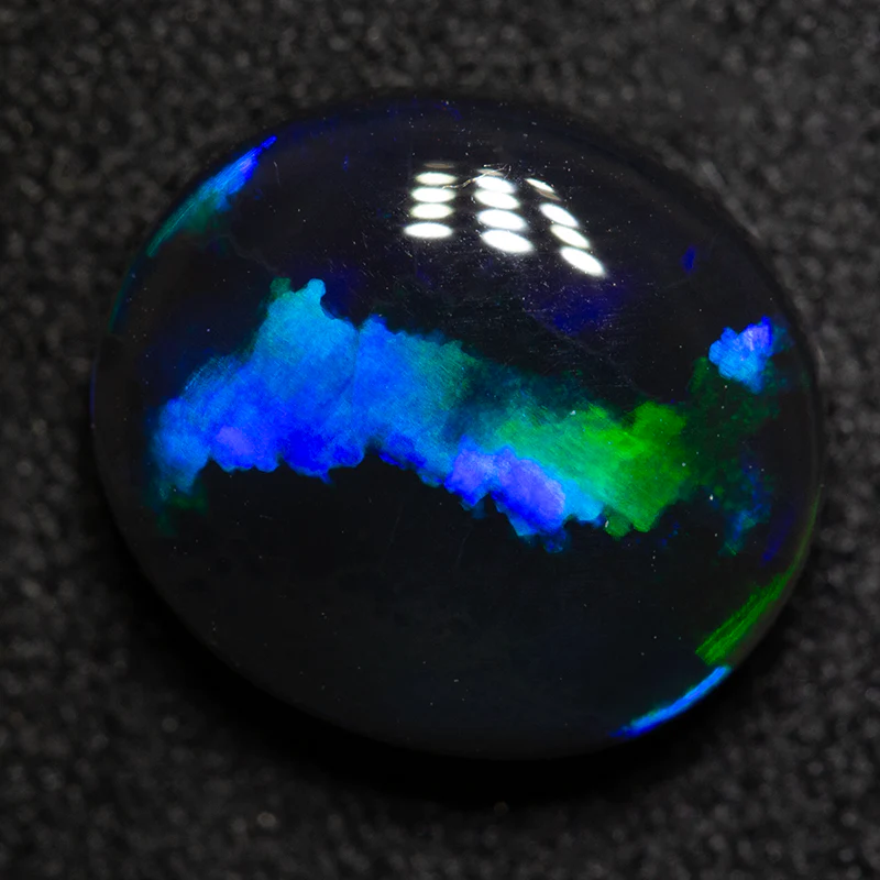 2.94 ct black opal 10.7x9.5x4.6mm - Image 5