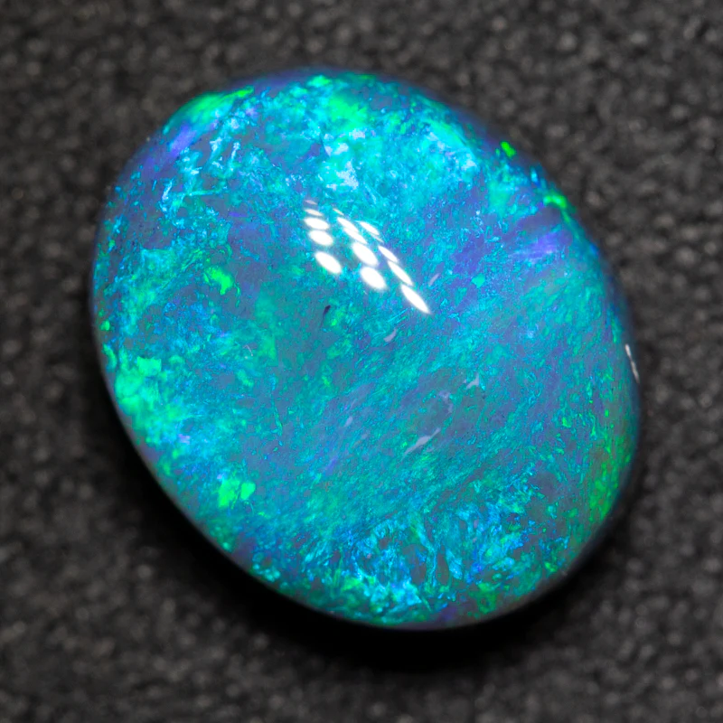 2.99 ct black opal 10.5x8.6x5.3mm - Image 2