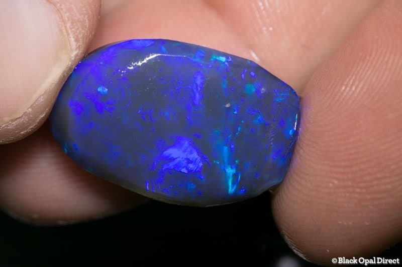 20.00 ct black opal rubbed piece 22mm across - Image 2