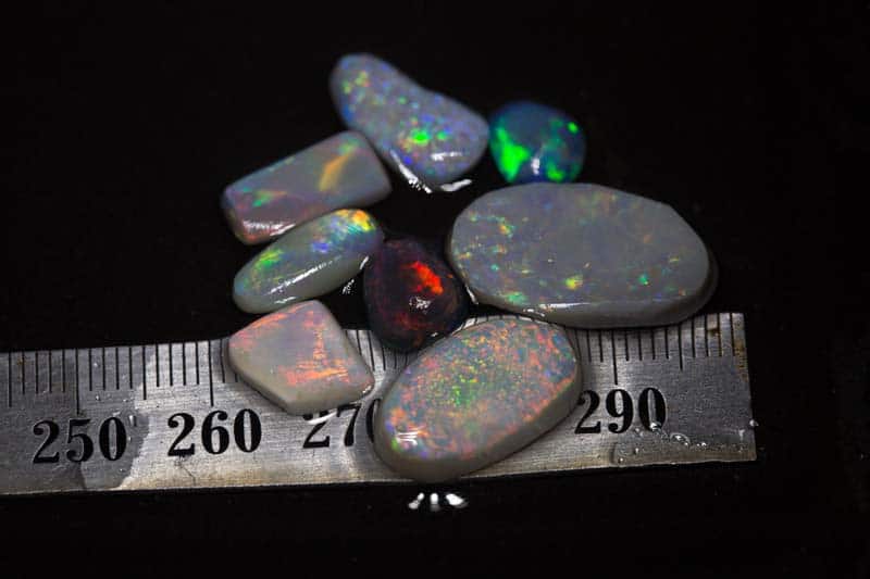 24.90 ct opal rubs 8 pieces - Image 2