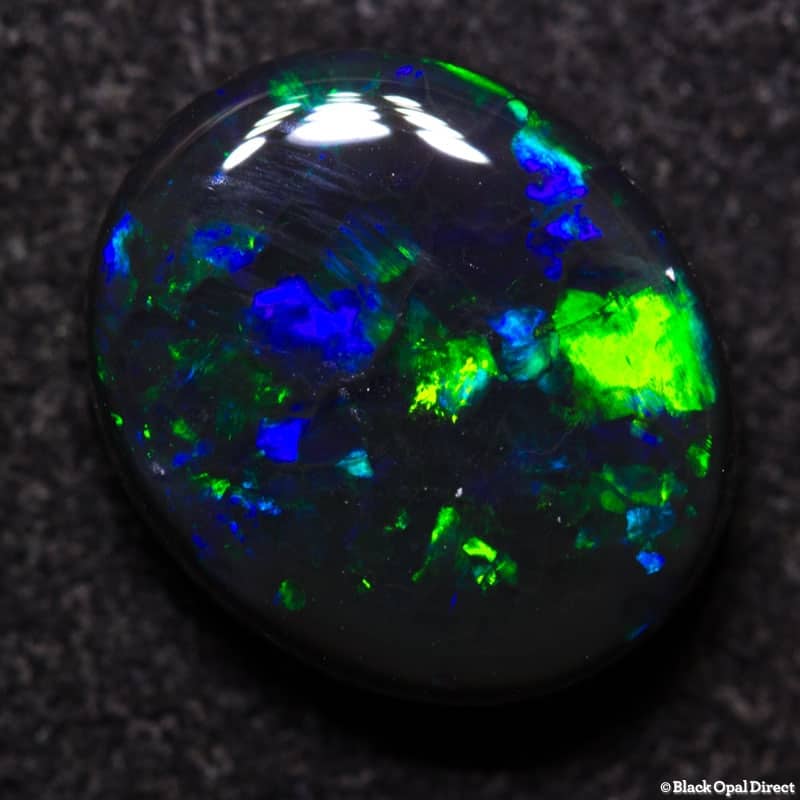 3.05 ct black opal 11x9x4mm - Image 2