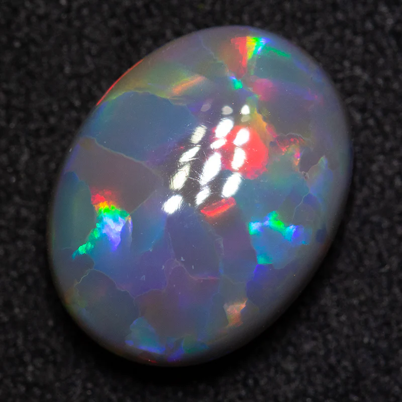 3.09 ct black opal 11.6x9x4.7mm - Image 2