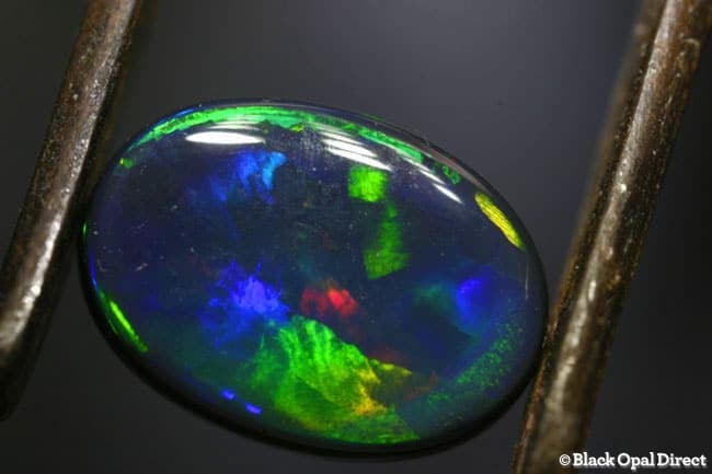 3.22 ct gem flag harlequin pattern black opal 12x9x4.5mm - Image 2