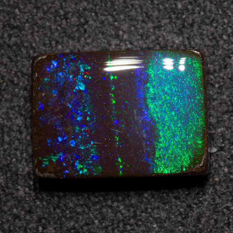 3.24 ct boulder opal 10x7.2x3.6mm - Image 2