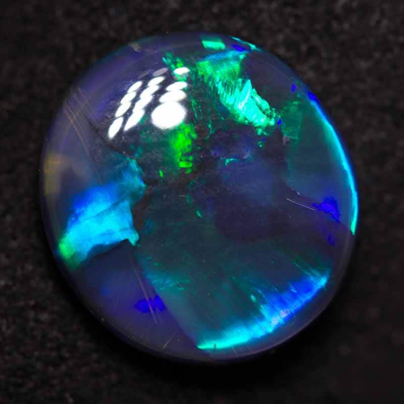 3.25 ct black opal 12x11x4mm - Image 2