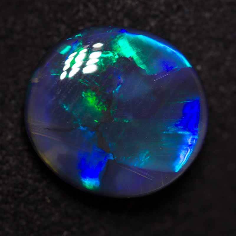3.25 ct black opal 12x11x4mm - Image 3