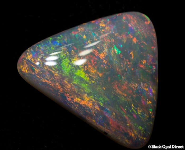 3.28ct light opal triangle 16x13x3mm - Image 2