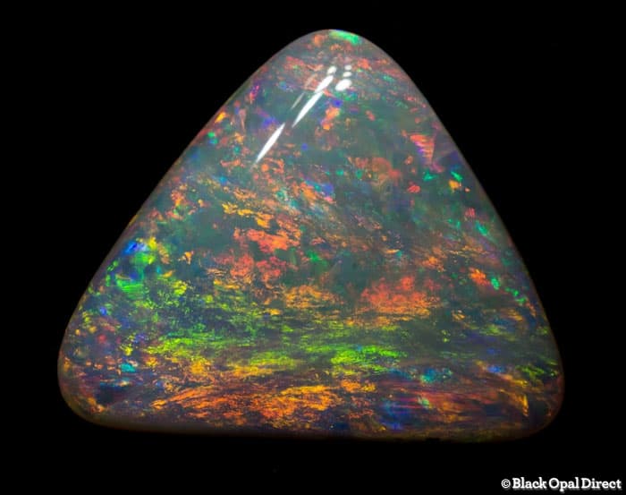3.28ct light opal triangle 16x13x3mm - Image 3