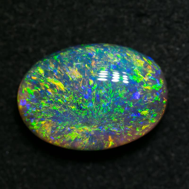 3.50 ct dark crystal opal 12x9x5mm - Image 2
