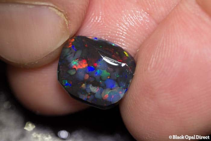 3.76 ct black opal rub 13mm across - Image 2