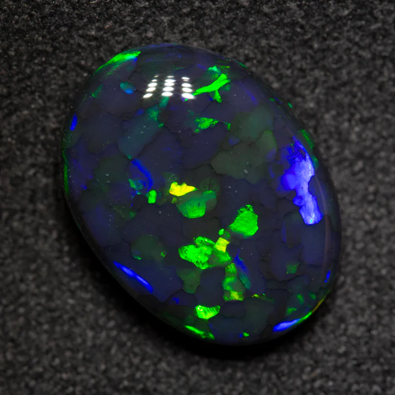 3.84 ct black opal 12.7x9.5x4.9mm - Image 4