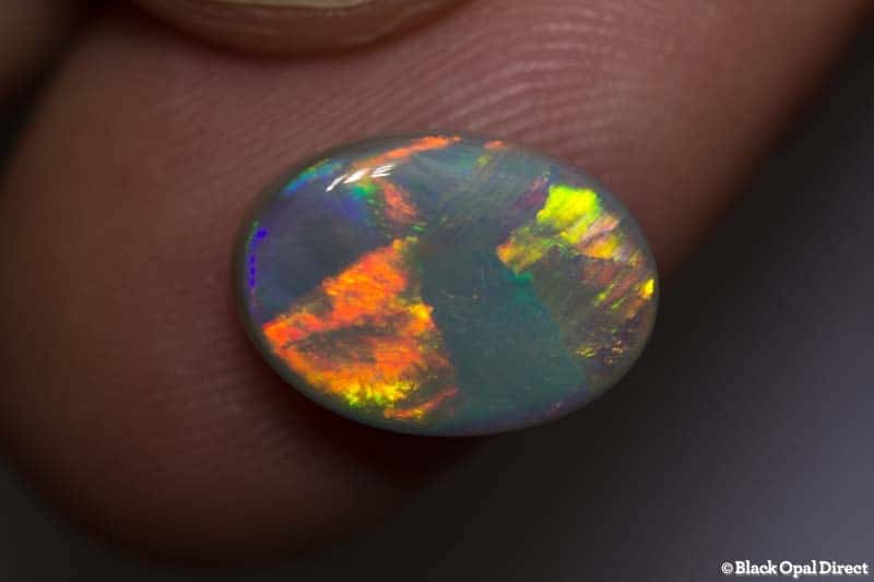 3.84 ct semi black opal double sided 13x9x4.2mm - Image 2