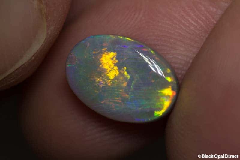 3.84 ct semi black opal double sided 13x9x4.2mm - Image 3