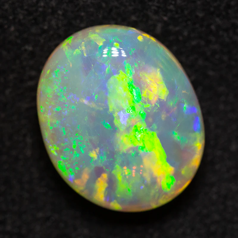 3.85 ct double-sided crystal opal 11.1x9.2x5.6mm - Image 2