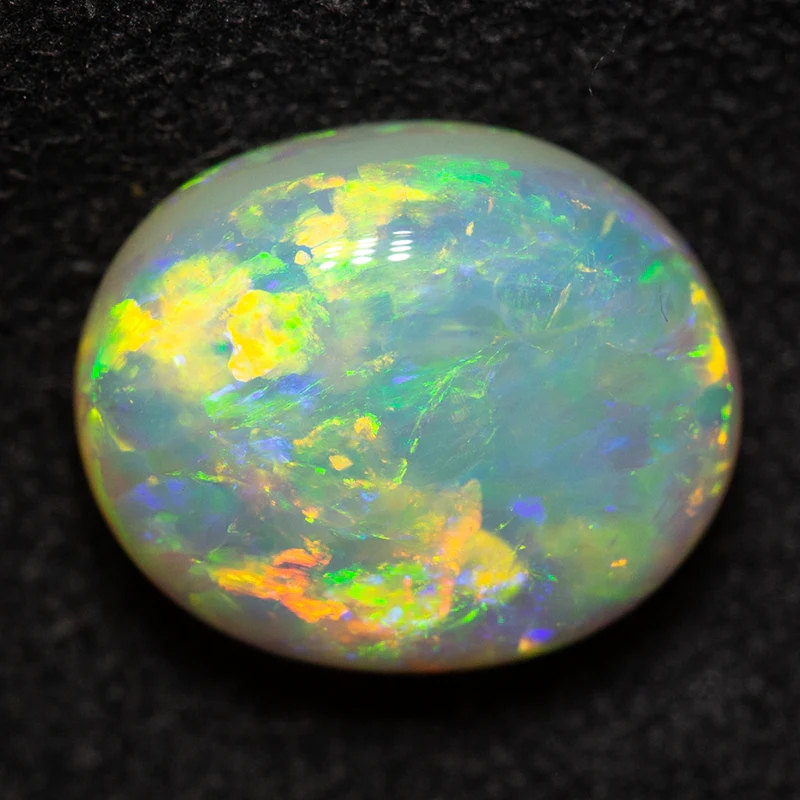 3.85 ct double-sided crystal opal 11.1x9.2x5.6mm - Image 4