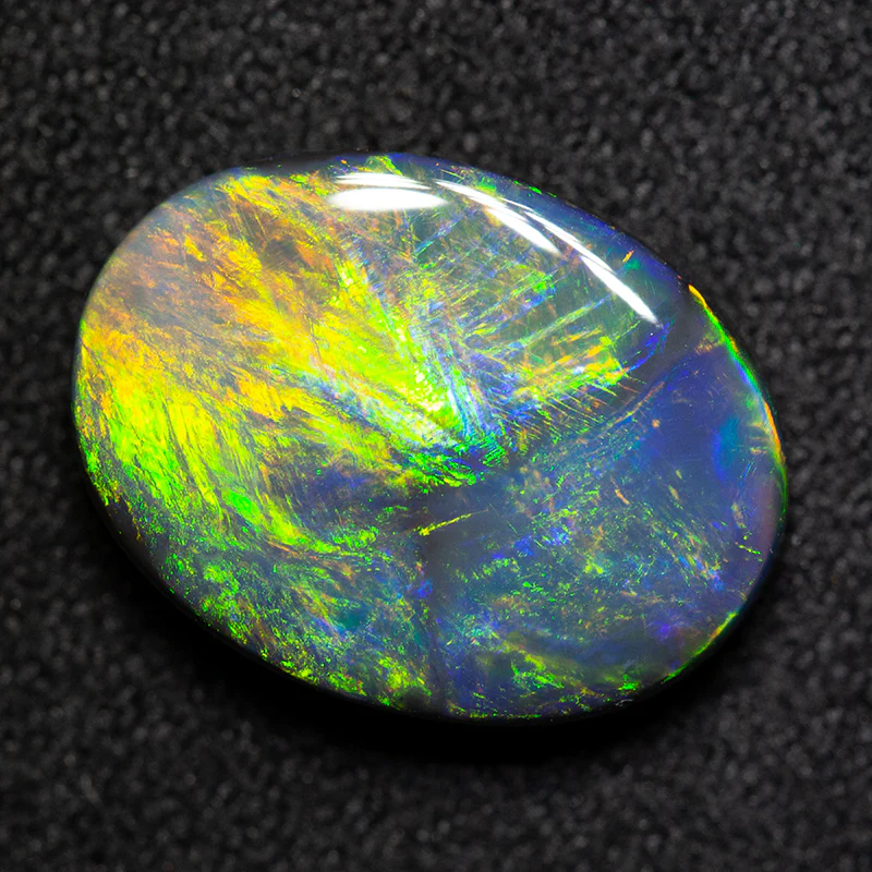 3.88 ct black opal 13.8x10.4x4mm - Image 2