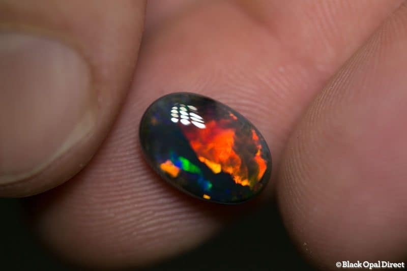 4.04 ct gem black opal 12x9.5x5mm - Image 6