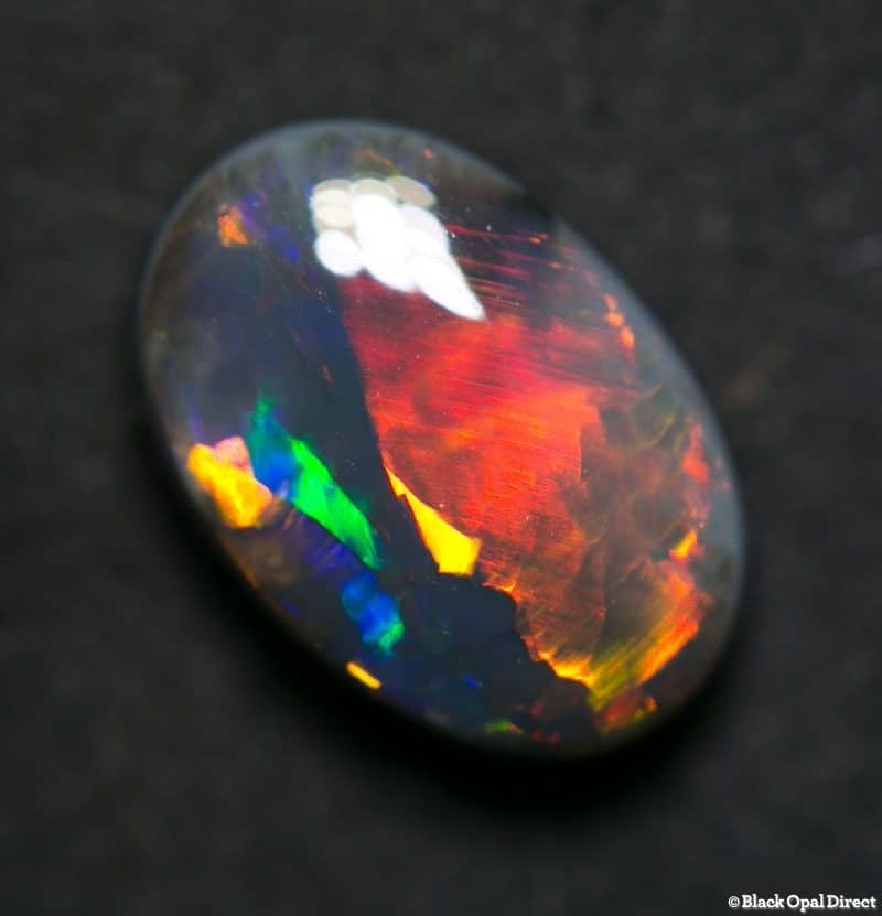 4.04 ct gem black opal 12x9.5x5mm - Image 7