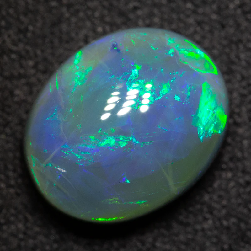4.09 ct black opal 11.4x9.3x6mm - Image 2