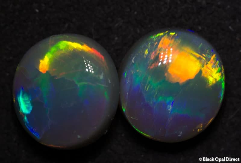 4.44 ct semi black gem opal pair 9x8.5mm including appraisal - Image 2