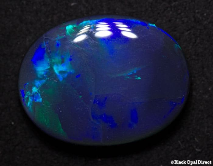 4.45 ct black opal with broad flash 14x11x4mm - Image 2