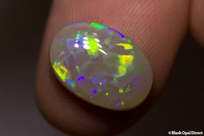 4.61 ct harlequin semi black opal 15x10x4mm - Image 2