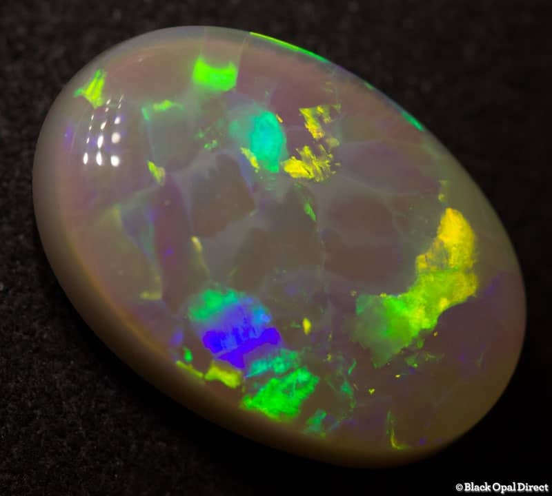 4.61 ct harlequin semi black opal 15x10x4mm - Image 4