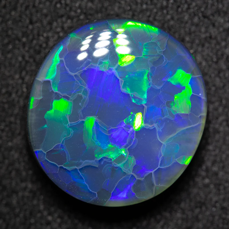 4.66 ct black opal 12.4x11.6x5mm - Image 2
